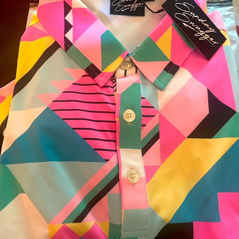 NWT men’s golf shirt…. Stand out from the rest